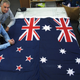 New Zealand’s current flag, at left, closely resembles Australia’s.
